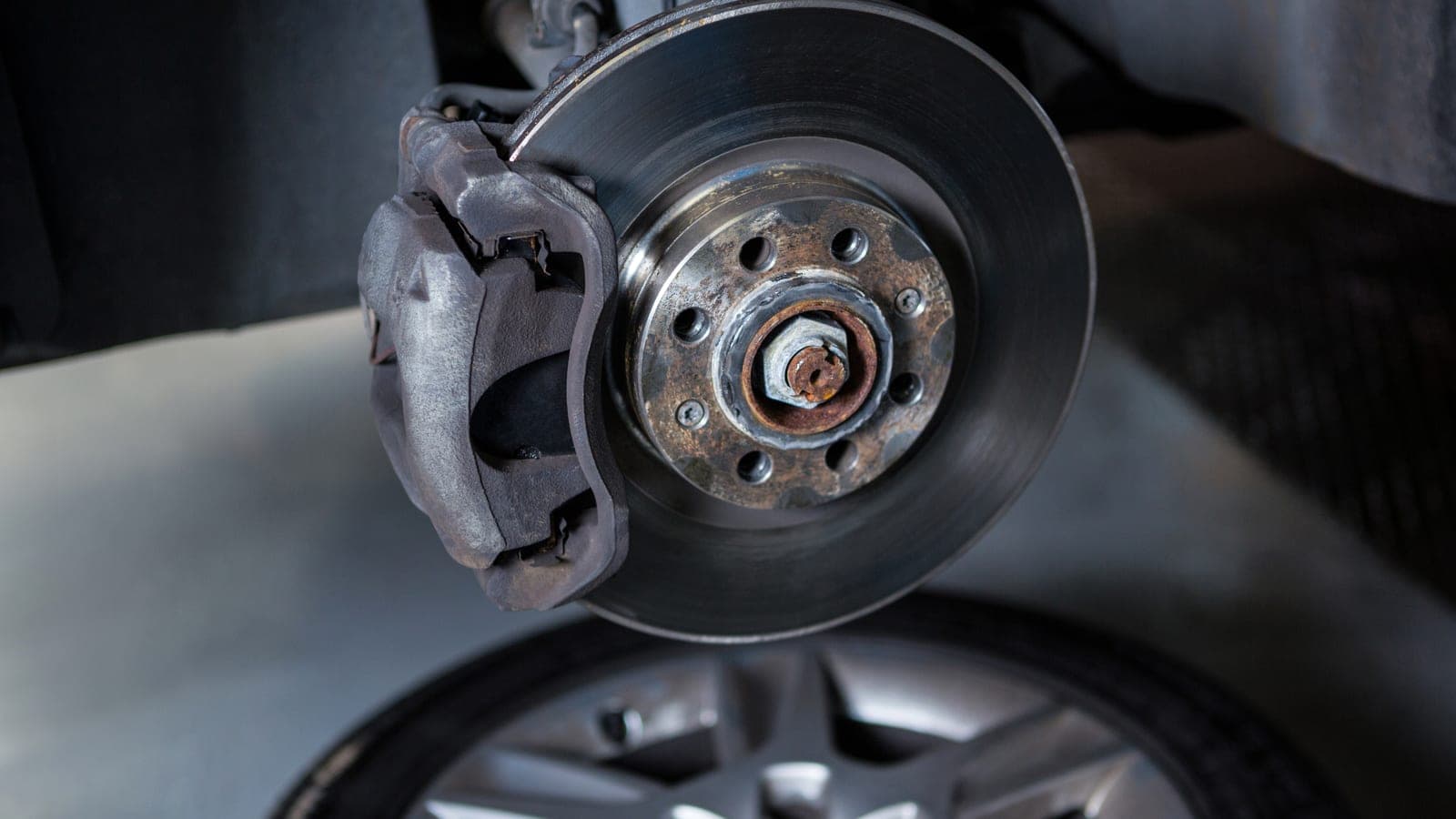 Close-up of a brake caliper and rotor
